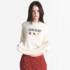 Flohmarktset mit Kaktusmotiv und Skims Boyfriend-Langarmshirt Flohmarktset mit Kaktusmotiv und Skims Boyfriend-Langarmshirt