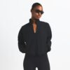 NikeSKIMS GEWEBTE NYLON-JACKE MIT HALBREISSVERSCHLUSS NikeSKIMS GEWEBTE NYLON-JACKE MIT HALBREISSVERSCHLUSS