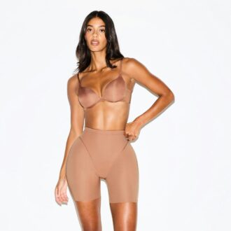 SKIMS BODY POTT AND HIP ENHANCEING MID TOBGH SHORT